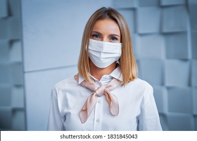 Female Receptionist Wearing Face Mask