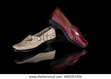 Female Red and Brown Shoe on Black Background, Isolated Product, Top View, Studio