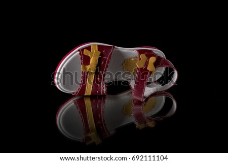 Female Red and White Sandal on Black Background, Isolated Product, Top View, Studio.