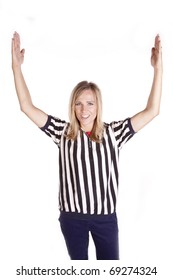 A Female Referee Is Making The Touchdown Signal.