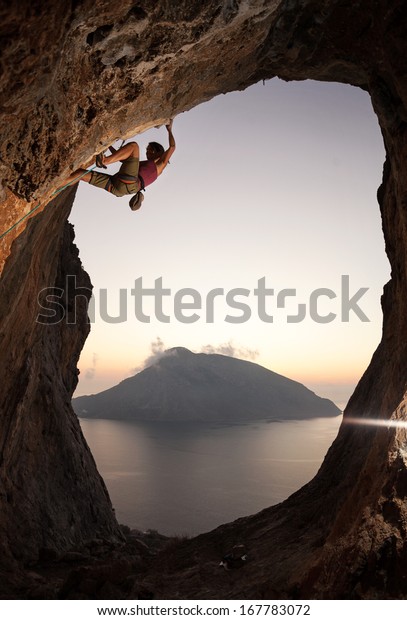 Female Rock Climber Hanging Upside Down Stock Photo (Edit 