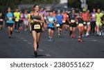 Female runner jog sport marathon. Woman athlete run long distance. Girl jogger work out urban public park. Sportswoman train body. Health city life concept. Fast run race slow motion. Active fit track
