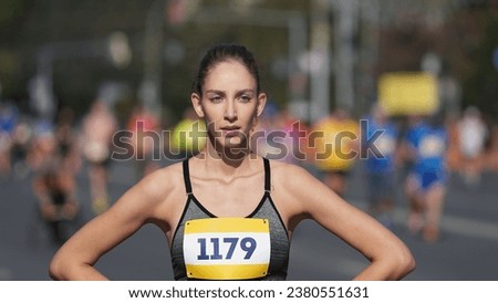 Female runner jog sport marathon slow motion. Tired woman athlete take break. Jogger work out. Deep breath. Girl run hard race. Sportswoman fit train public park. Fast city life. Long road distance.