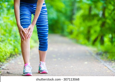 Female Runner Knee Injury And Pain.