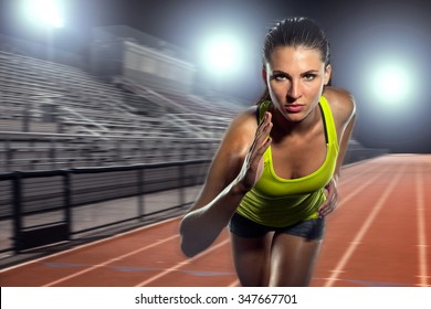 Female Runner Sprinter Exercising And Training Intense Track And Field Athlete Determination For Greatness In Sports