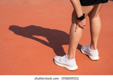 Female Runner Suffering From Hamstring Strain. A Hamstring Strain Refers To An Injury In Which The Muscle Or Tendon Is Stretched Or Torn.