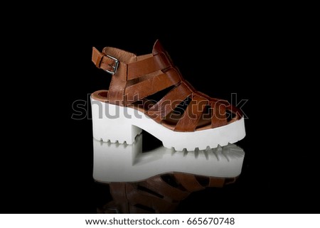 Female Sandal on Black Background, Isolated Product, Top View, Studio.
