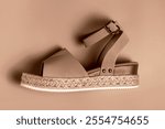 Female sandal trending color concept of year 2025 Mocha Mousse.