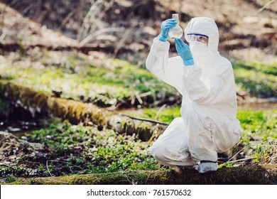 Female Scientist Examining Liquid Contents Flask Stock Photo 761570632 ...