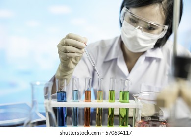 Female scientist researching in laboratory - Powered by Shutterstock