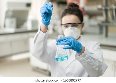 Female Scientist Working In The CDC Laboratory.