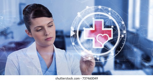 Female Scientist Writing On Glass Wall Against Consultation Room