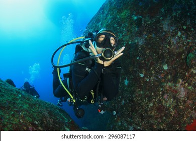 Female Scuba Diver Having Fun