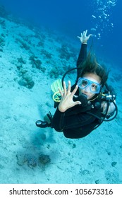 Female Scuba Diver Shows Off Her Wedding Ring