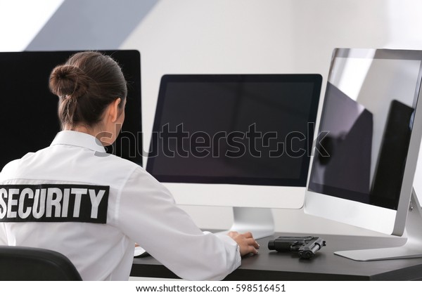 Female security guard on\
workplace
