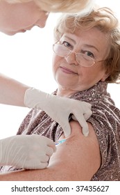 Female Senior Getting An Swine Flu Shot