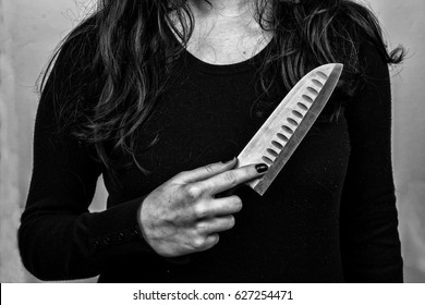 Female Serial Killer Holding A Knife In His Hand