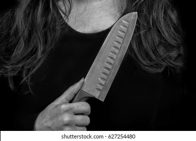 Female Serial Killer Holding A Knife In His Hand