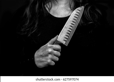 Female Serial Killer Holding A Knife In His Hand