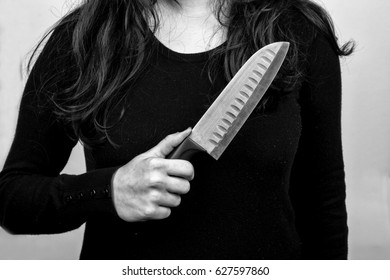 Female Serial Killer Holding A Knife In His Hand