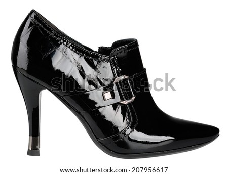 Female shiny black patent-leather shoe with high heel on white background