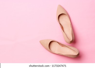 
female shoes with heels on a colored background. Women's shoes, office shoes.