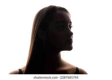 Female silhouette. Beauty model. Facelift skin rejuvenation. Backlit profile portrait of confident woman face on white free space background. - Shutterstock ID 2287681745