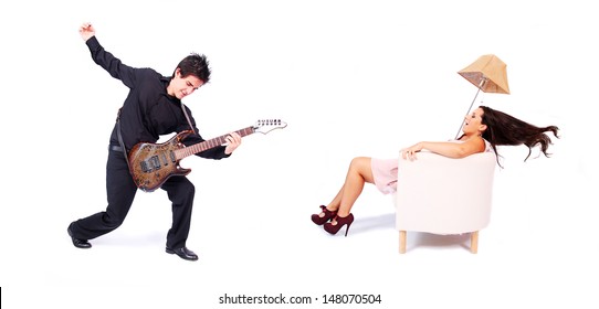 A Female Singer And A Male Guitarist In Action In White Background. The Singer Is Blown Away By The Powerful Sound Of The Guitar