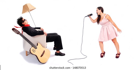 A Female Singer And A Male Guitarist In Action In White Background. The Musician Is Blown Away By The Powerful Voice Of The Singer