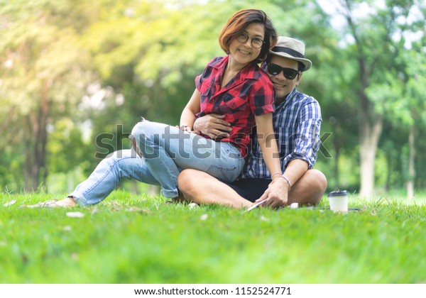 Female Sitting On Man Lap Green Stock Photo 1152524771 