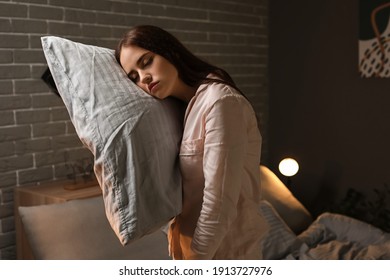 Female Sleepwalker In Bedroom At Night