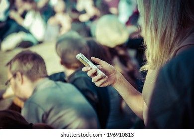 Female Smartphone User In Public