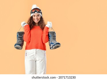 Female Snowboarder On Color Background