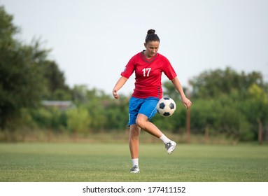 Female Soccer Player On The Field