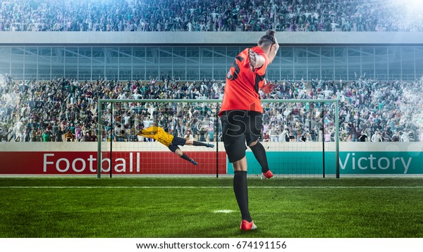 female\
soccer player taking penalty on crowded\
stadium