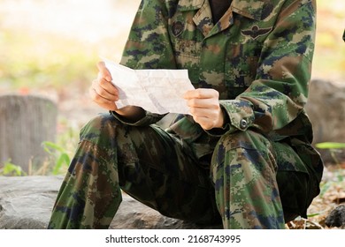 Female Soldier Reading A Letter.