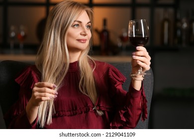 Female Sommelier Tasting Types Of Wine