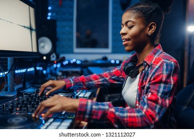 Female Sound Engineer In The Recording Studio