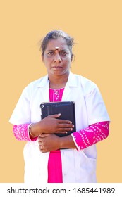 Female South Asian Doctor Holding A Digital Tablet.