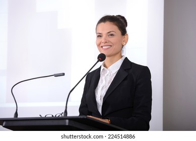 Female Speaker At The Board. Business Conference