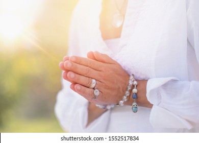 Female Spiritual Healer Practicing Mindfulness, Sensing And Increasing Positive Energy. Hand Gesture