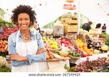 Female Stall Holder At Farmers Fresh Food Market ストックフォト © 