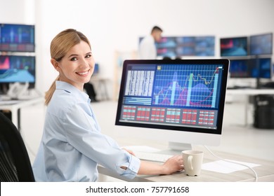 Female Stock Trader Working In Office