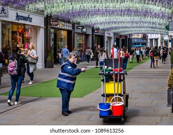 Female Street Cleaner In Southgate Shopping Centre, Bath, Somerset, UK Taken On 13 May 2018