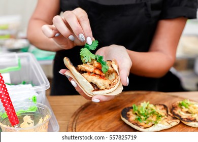 Female Street Vendor Hands Making Taco Outdoors. Mexican Cuisine Snacks, Cooking Fast Food For Commercial Kitchen.