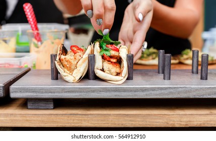 Female Street Vendor Hands Making Taco Outdoors. Mexican Cuisine Snacks, Cooking Fast Food For Commercial Kitchen.