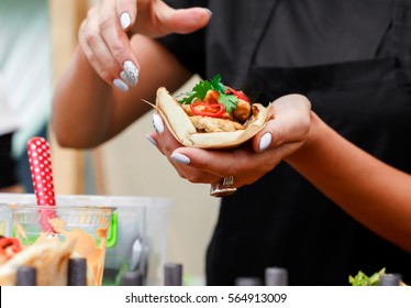 Female Street Vendor Hands Making Taco Outdoors. Mexican Cuisine Snacks, Cooking Fast Food For Commercial Kitchen.