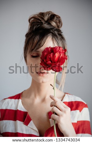 Similar – Portrait of real serene woman with vivid dyed pink fuchsia hairstyle. Peony flower, green nature backdrop. Trendy colorful hair, stylish haircut