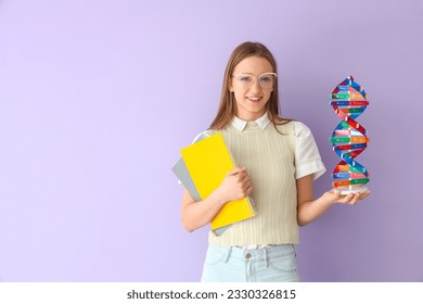 Female student with DNA model and notebooks on lilac background - Powered by Shutterstock