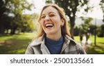 Female student, happy and laughing in park for study opportunity, knowledge and school with smile. Woman, excited and sunshine at campus, university or college for education, learning and scholarship